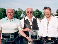 Jack Sinclair (left), Bill Sinclair and Roger Sinclair with best clan tent award at Halifax, 2002