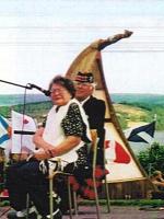 Mi'kmaq poet Rita Joe speaking while CSAC president Bill Sinclair listens